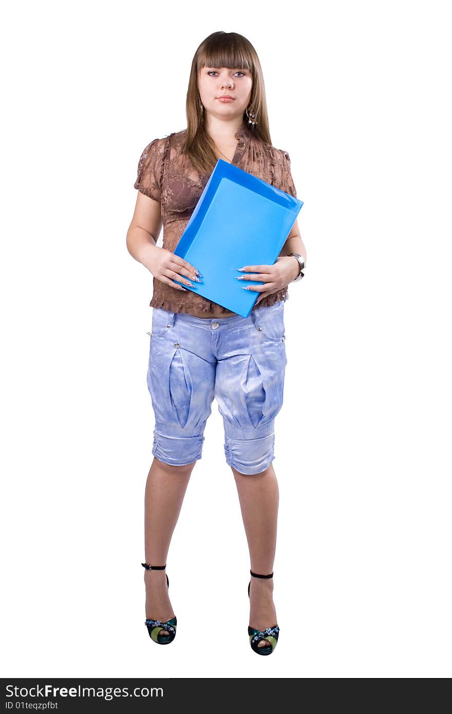 The young beautiful businesswoman at office behind work on a white background. The young beautiful businesswoman at office behind work on a white background