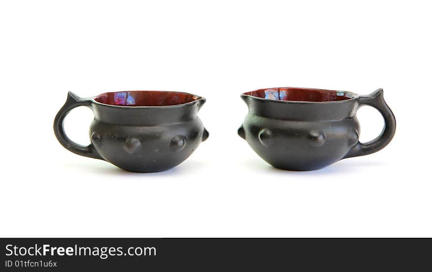 Two black decorative ceramic pots isolated