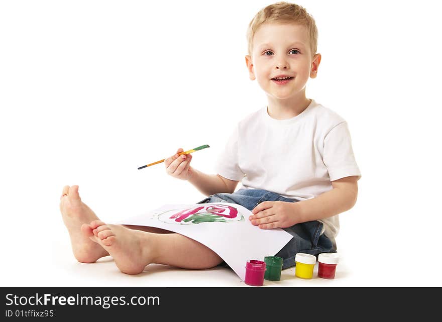 Little boy painting sitting on floor. Little boy painting sitting on floor