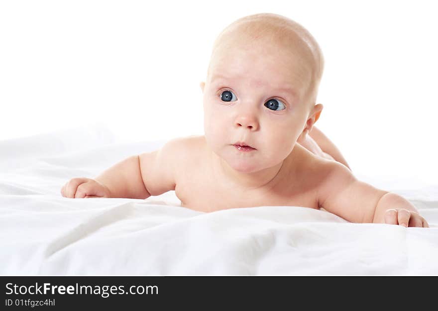 Cute baby boy looking with surprise