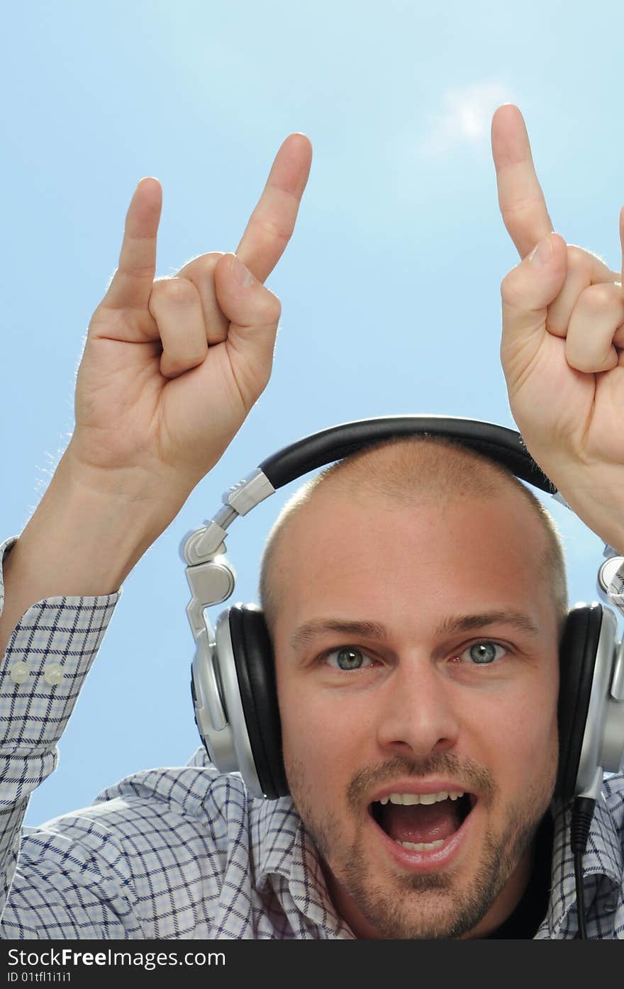 Disc jockey with headphones and arms up. Disc jockey with headphones and arms up