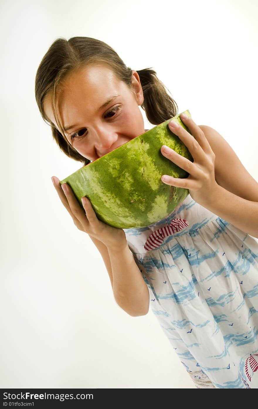 Young Girl Eating A Watermelon