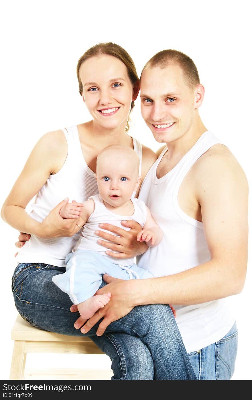 Happy young family over white