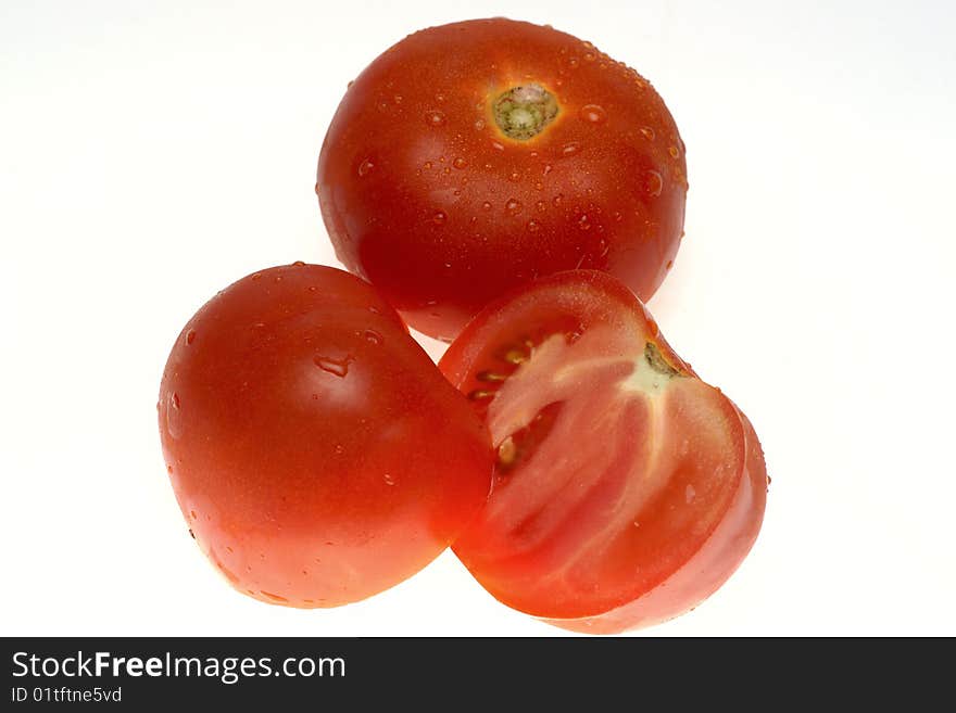 Red tomatoes on a white background