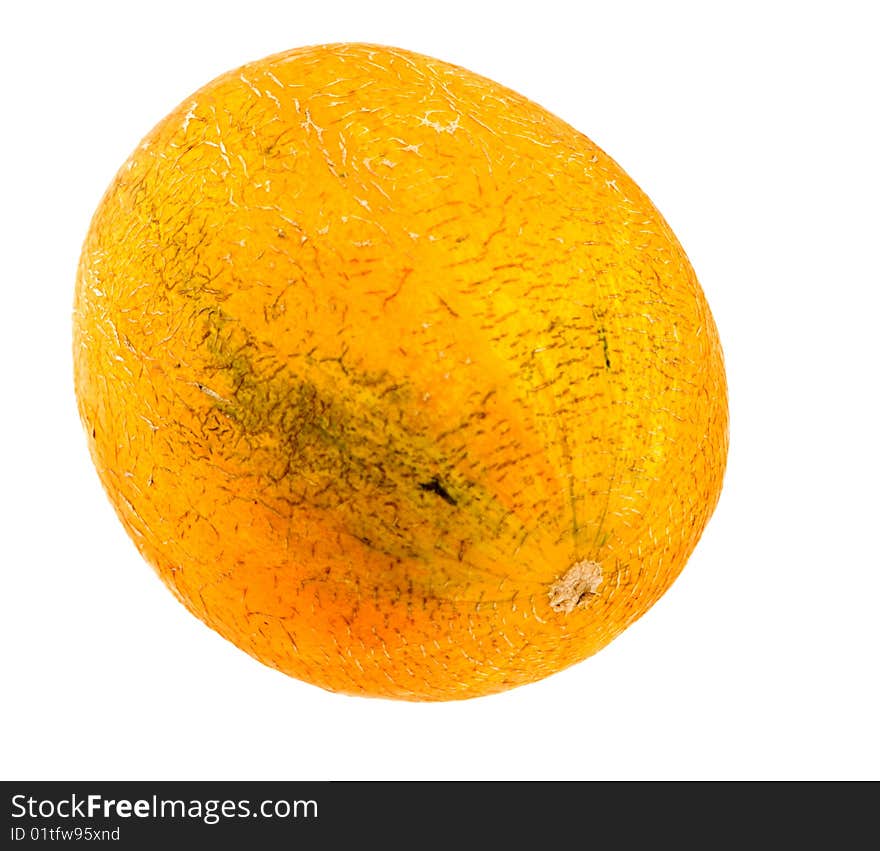 Ripe, yellow melon on a white background