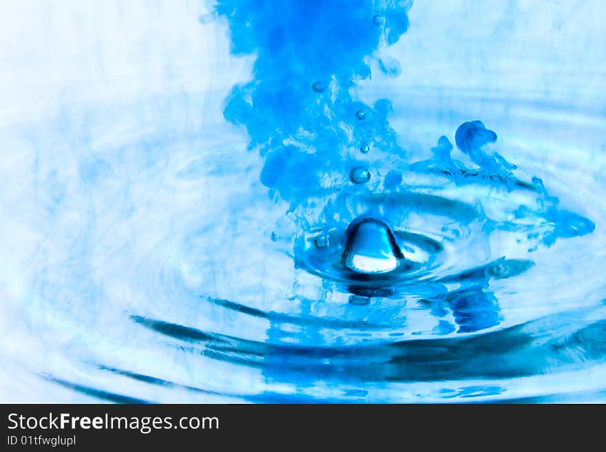 Close-up of ink drop in water. Frozen time. Close-up of ink drop in water. Frozen time