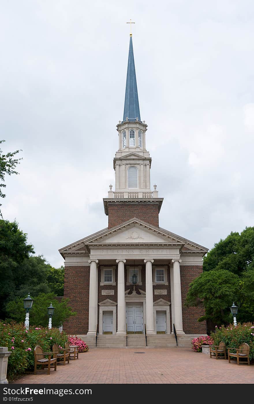 A southern church with a tall steeple. A southern church with a tall steeple