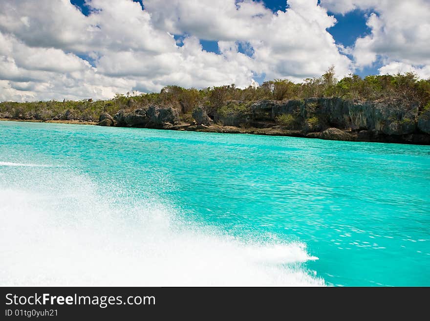 White sand beach blue ocean and sky