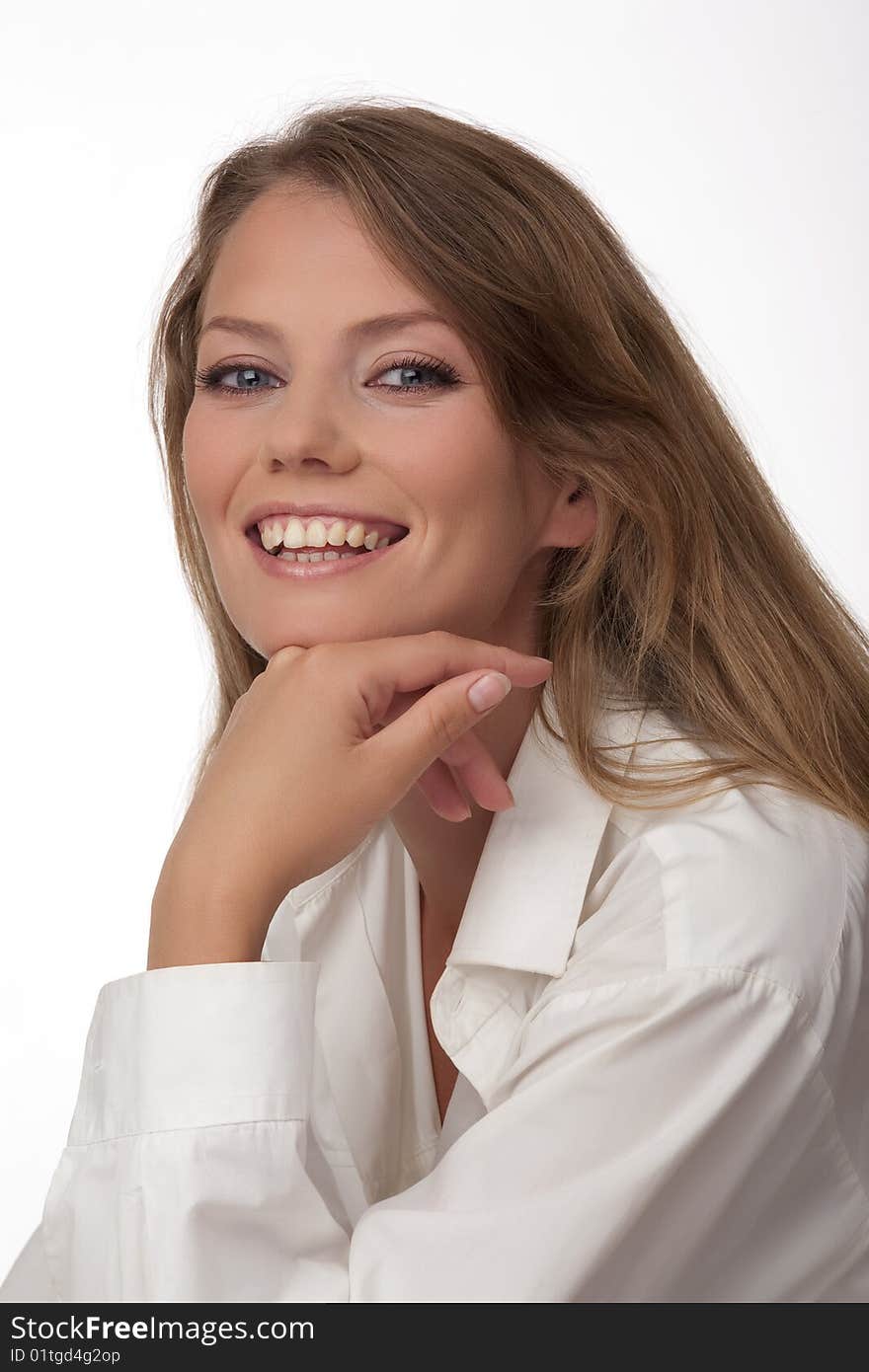 Portrait close up of the young European happy woman with blue eyes, on a white background. Portrait close up of the young European happy woman with blue eyes, on a white background