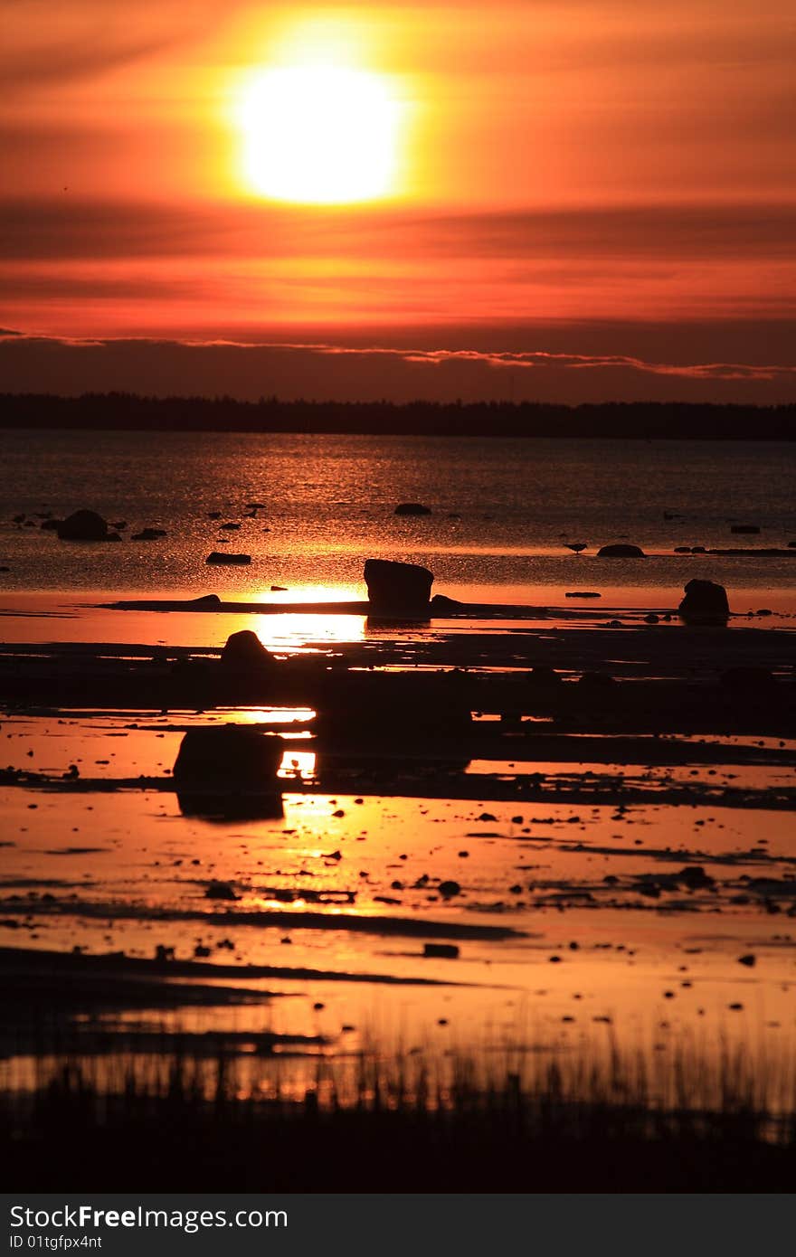 Sunset on the sea shore in Finland