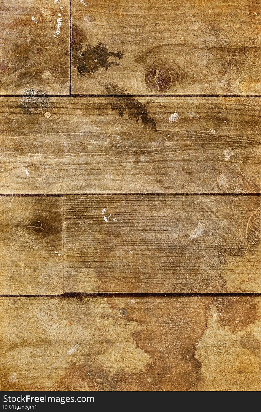 Grungy stained wood planks, perfect to use as a background