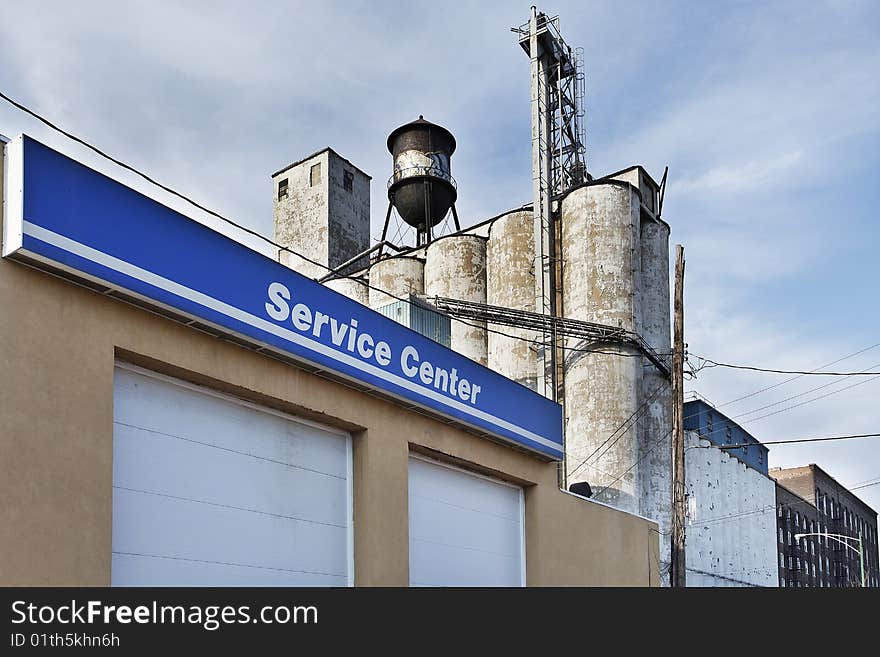 Factory area near downtown with service center sign