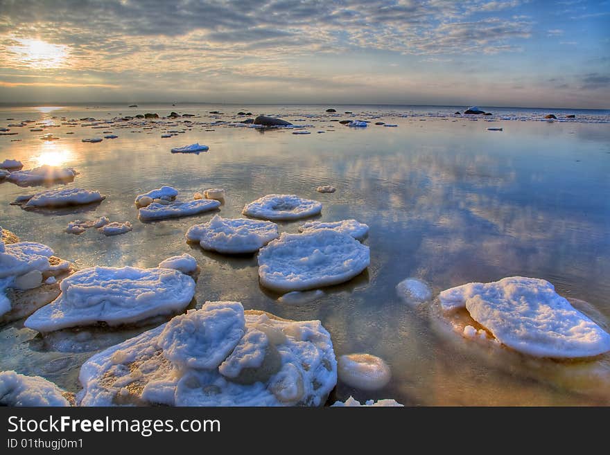 Landscape with winter sea under sky with clouds. Landscape with winter sea under sky with clouds