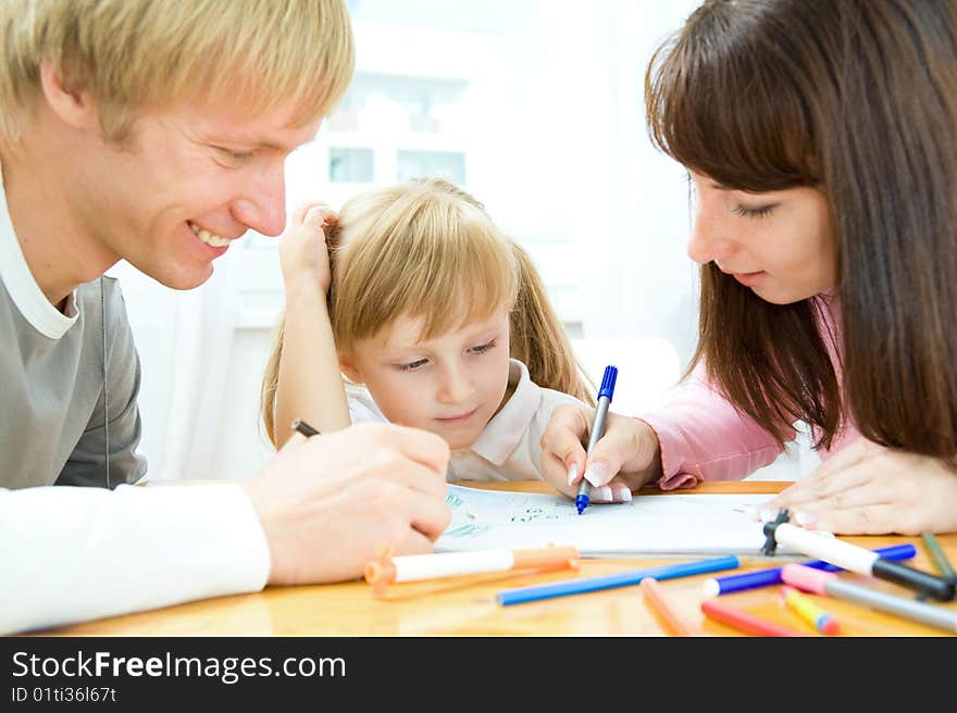 A mother, a father and a daughter drawing. A mother, a father and a daughter drawing