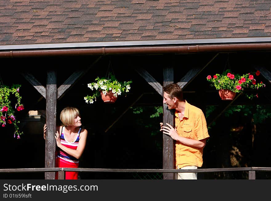 Young couple on wooden terrace