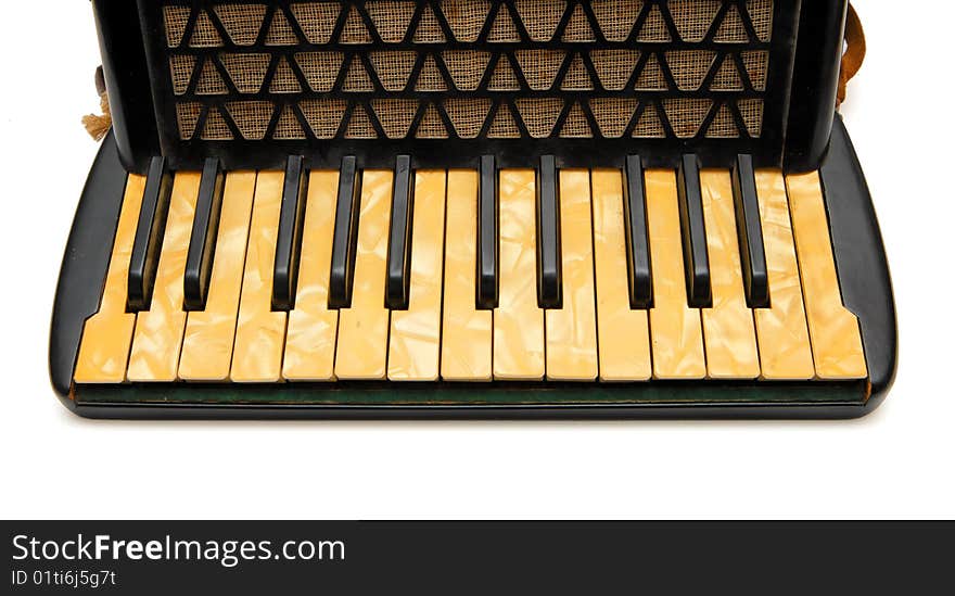 Keyboard of vintage 1930s black accordion closeup