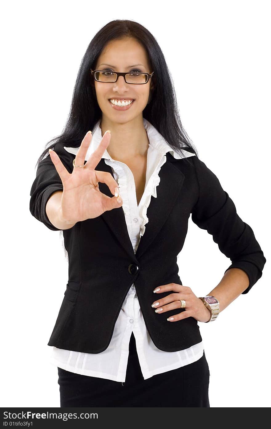 Attractive businesswoman making her ok sign. Attractive businesswoman making her ok sign