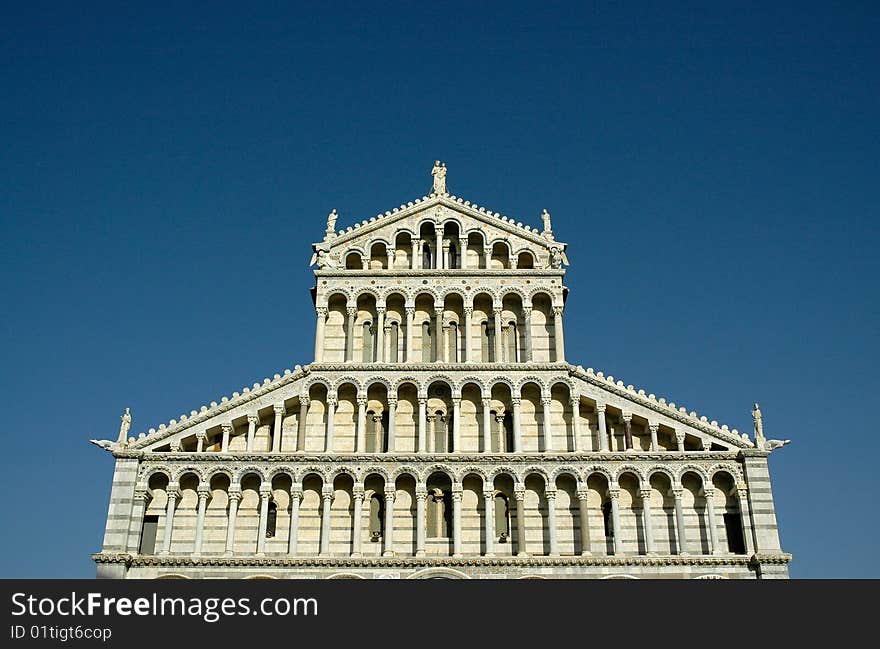 Pisa Duome fragment on the blue sky. Pisa Duome fragment on the blue sky