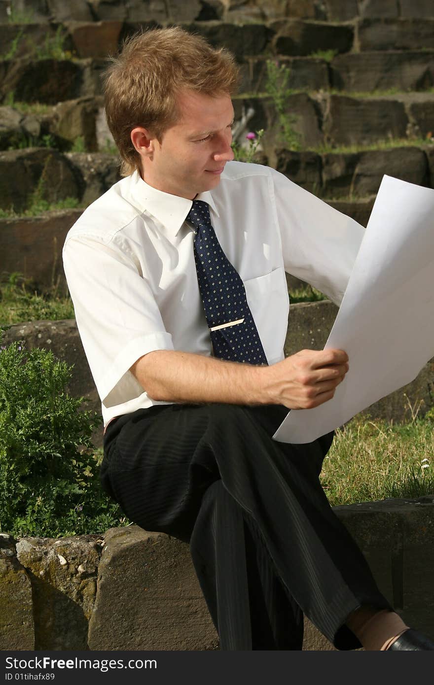 Man Reading Plans