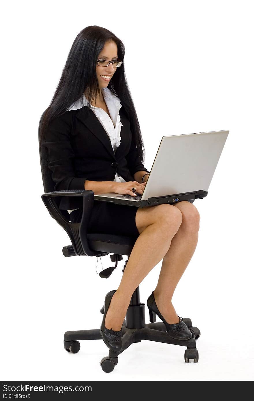 Businesswoman with laptop in chair over white