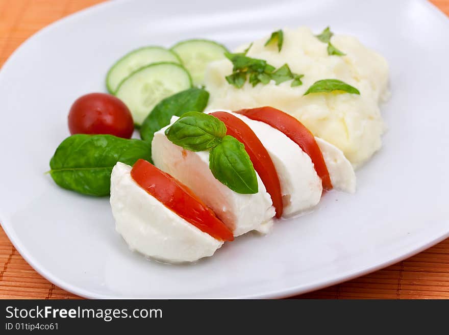 Mozzarella - Tomato Salad,with cucumber.