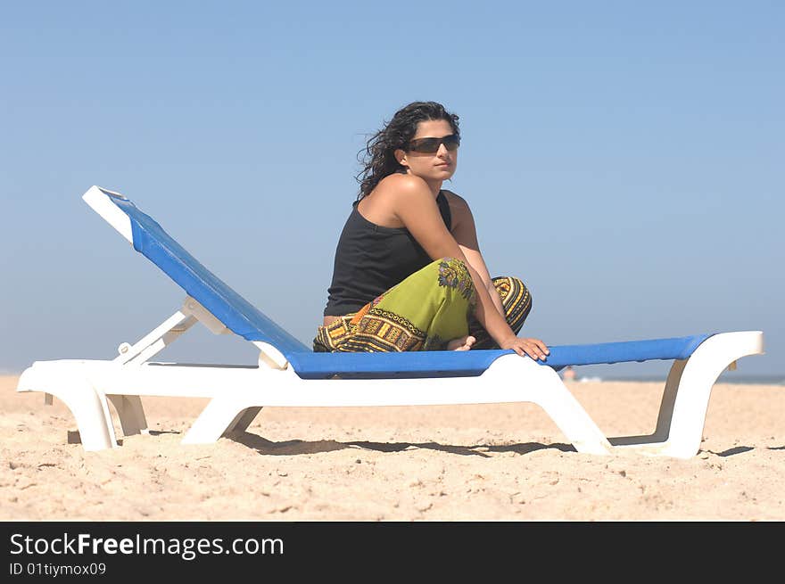 Beautiful brunette on the beach