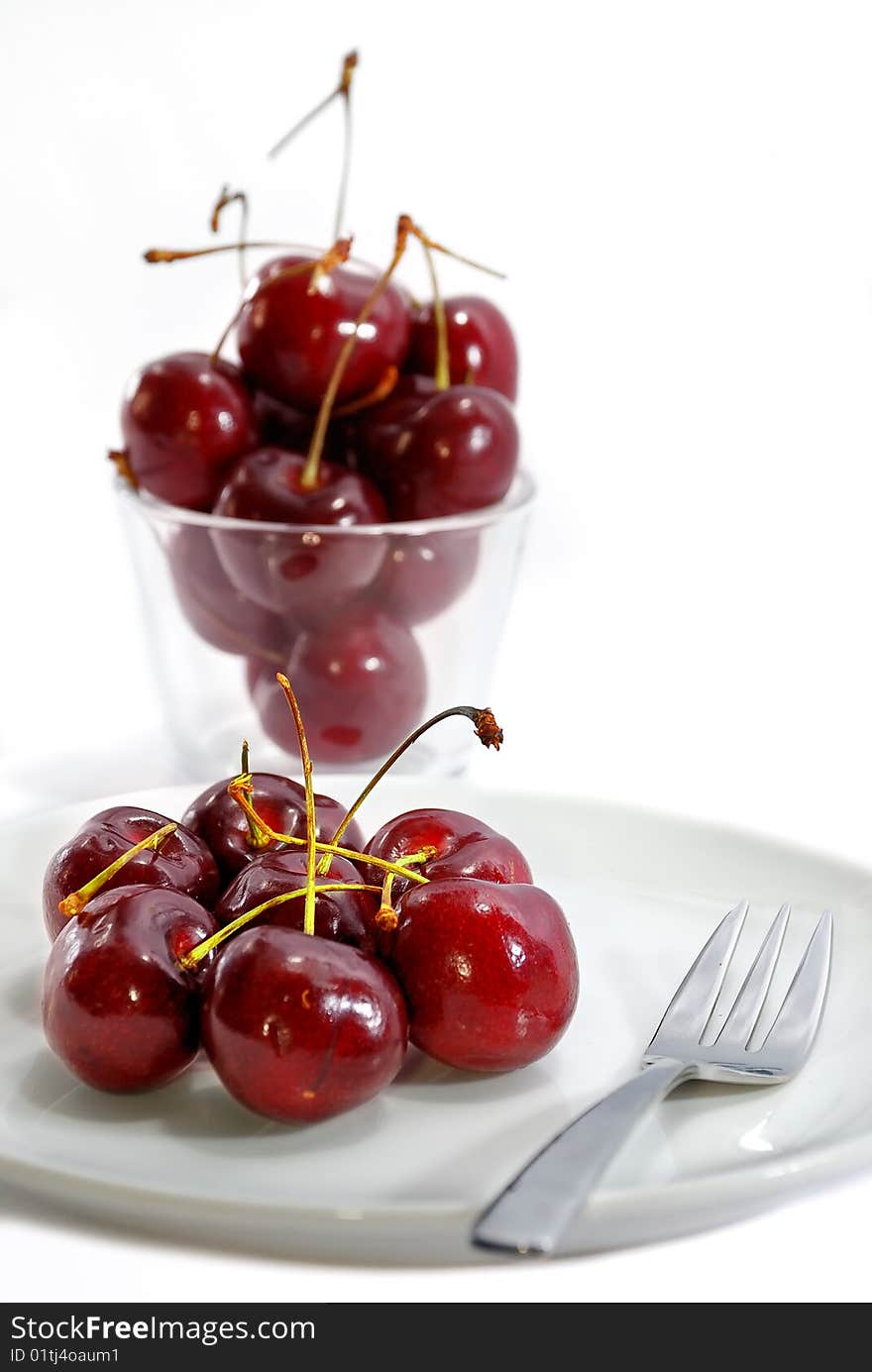 Fresh Cherry Fruit on plate with White Background. Fresh Cherry Fruit on plate with White Background