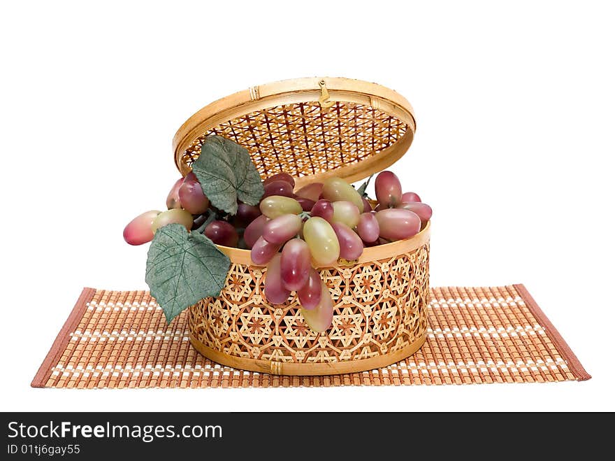 Bast basket with a grapes