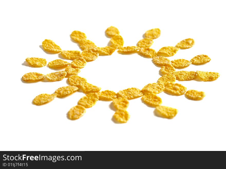 Corn flakes sun symbol isolated over white background. Corn flakes sun symbol isolated over white background