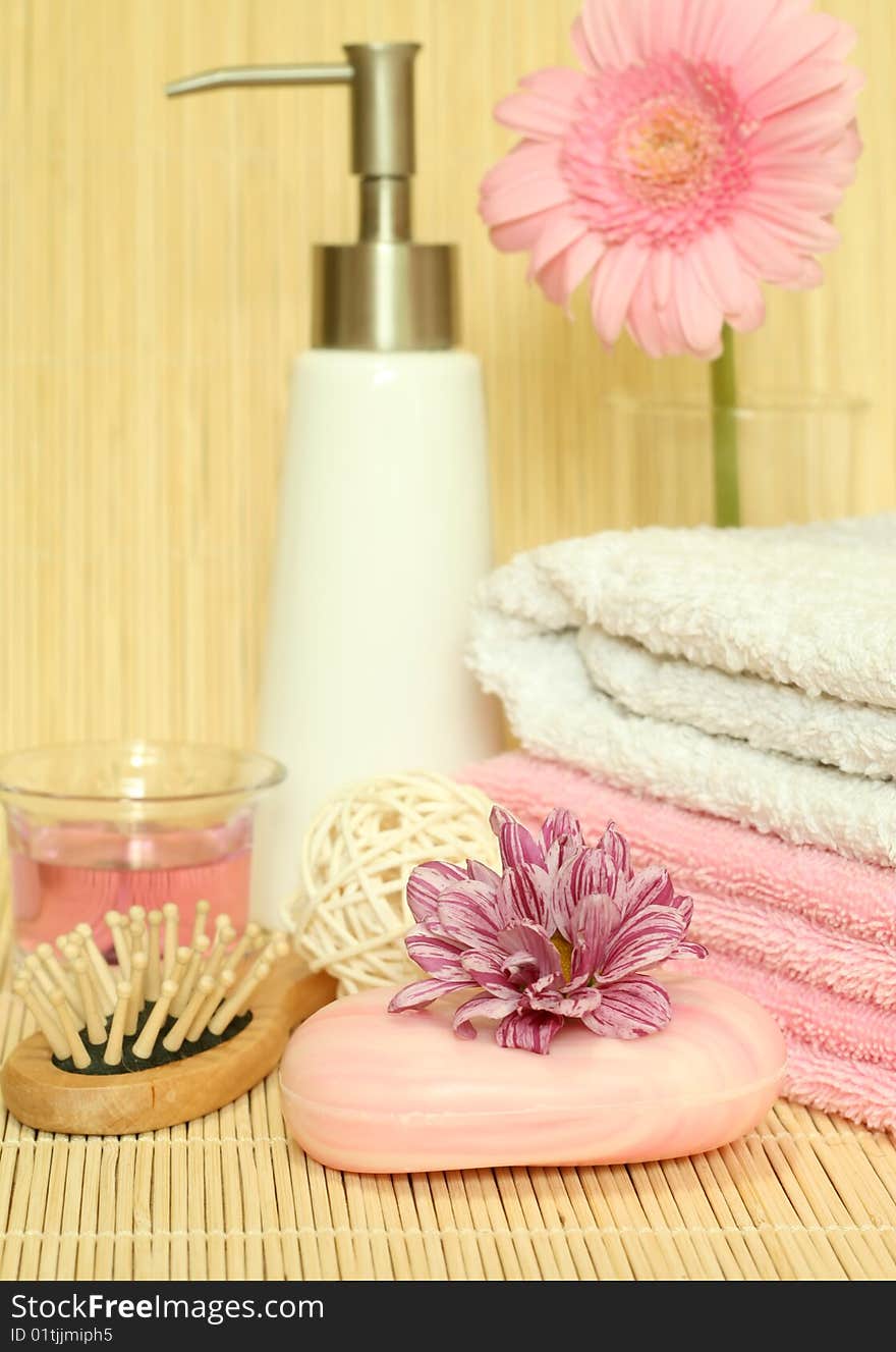 Spa essentials. Towels, soap, flowers.