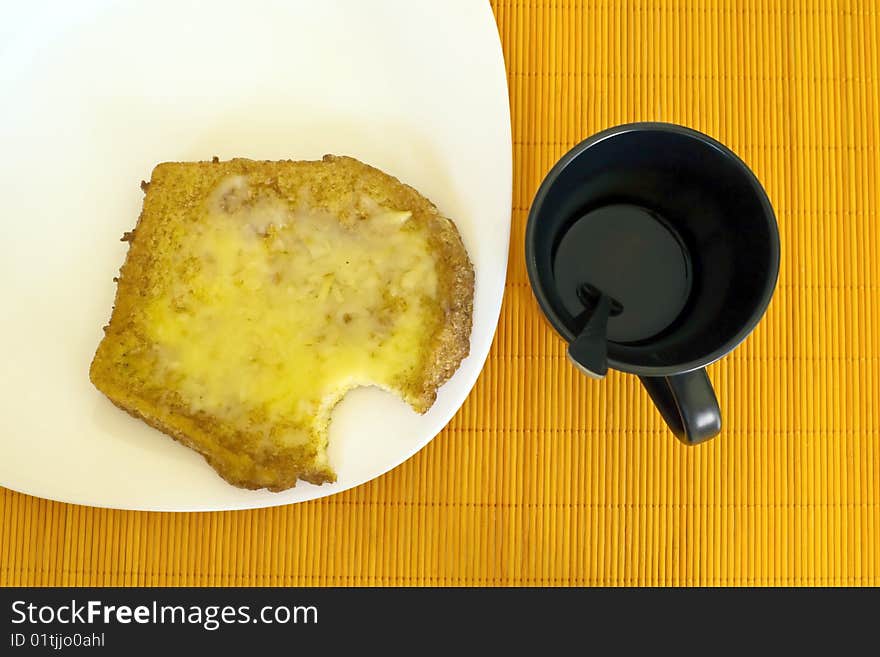 Bread, cup of tea served nicely. Bread, cup of tea served nicely