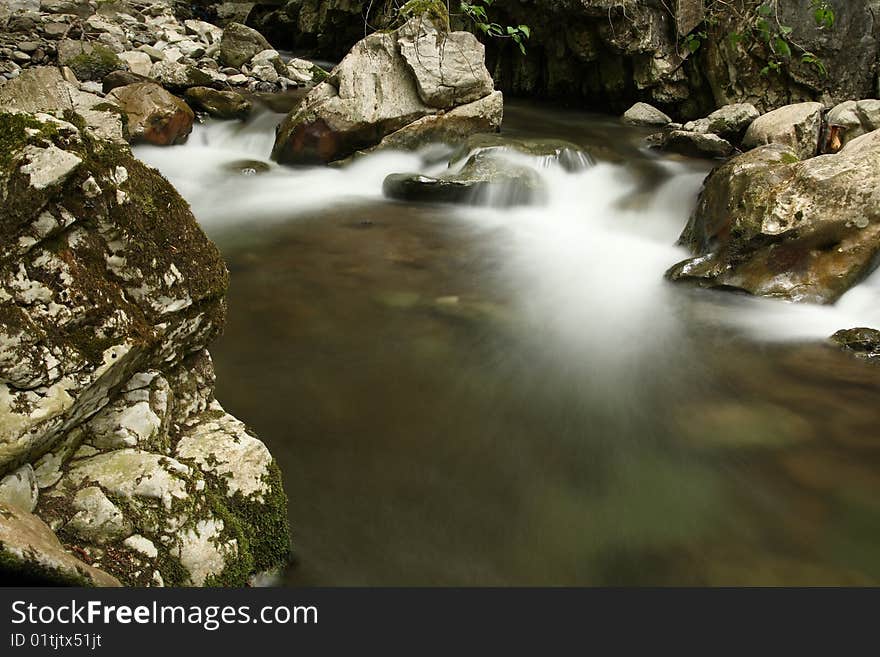 River in the forest, slow shutter photo