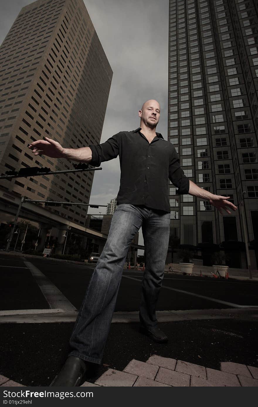 Handsome man balancing on the streets