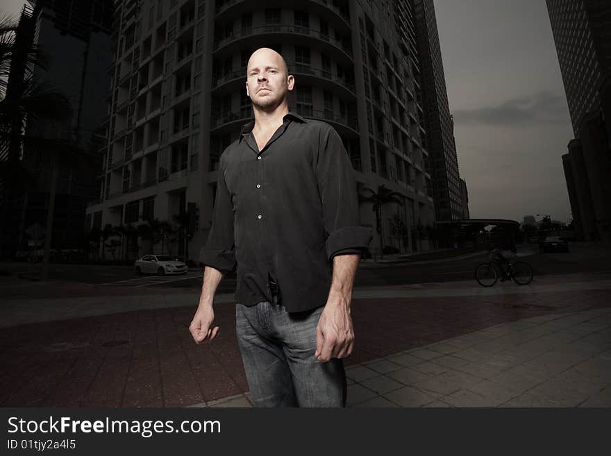 Man standing in the city at night. Man standing in the city at night