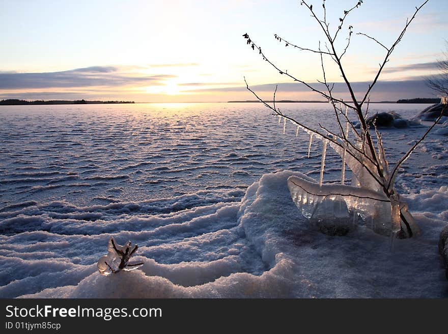 Sunset Over Frozen Lake