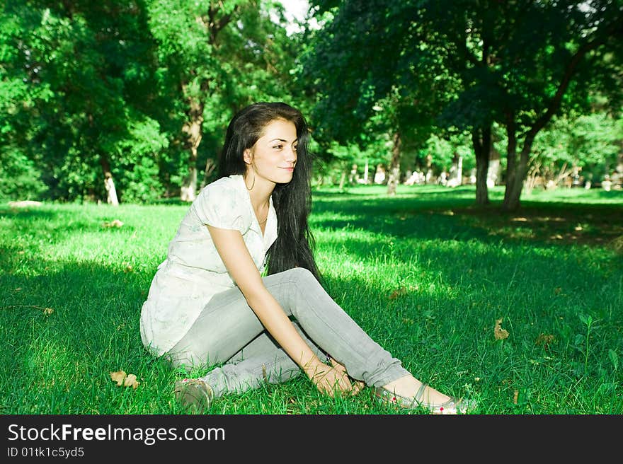 Girl in the park on a sunny summer day