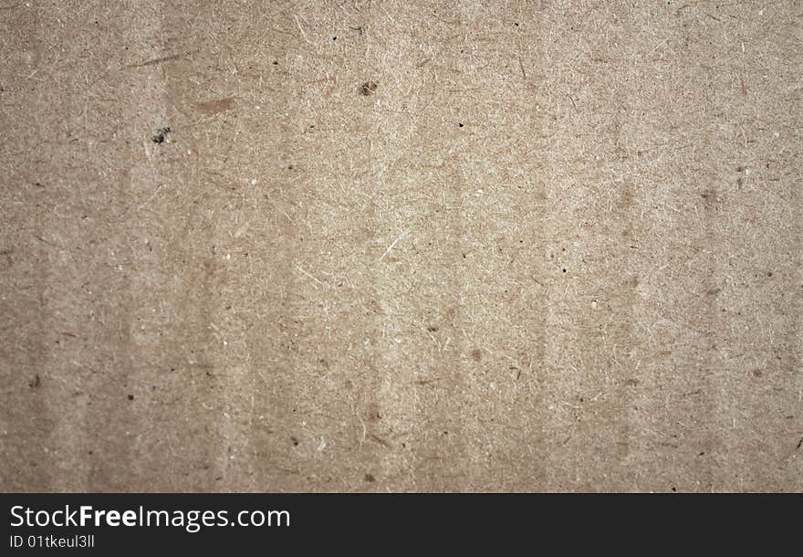 Texture of coarse gray cardboard close up