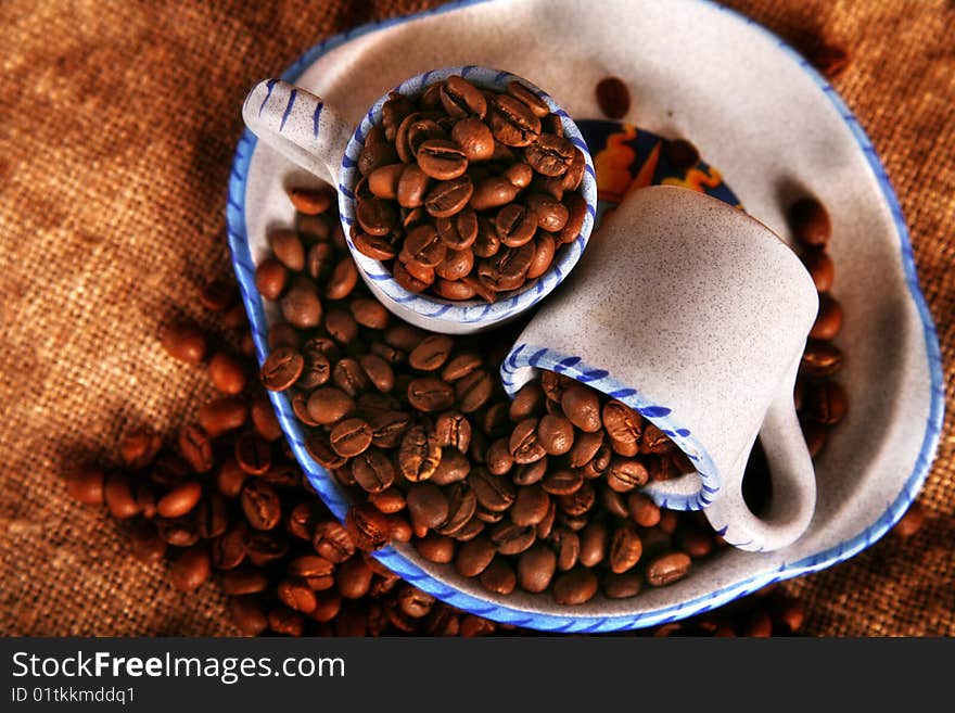 Cup and beans of coffee