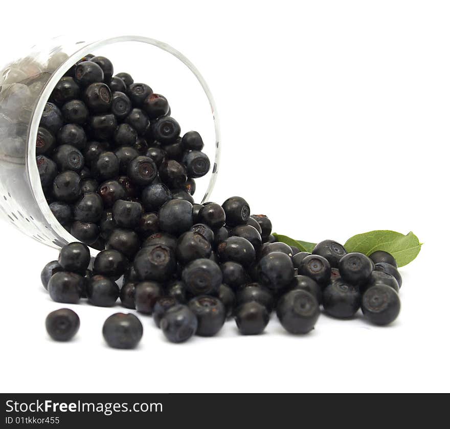 Bluberries with glass isolated on white. Bluberries with glass isolated on white