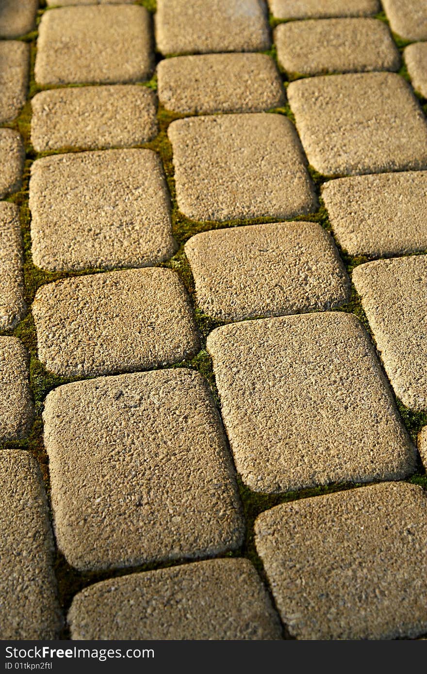 Pavement stones in the light of setting sun