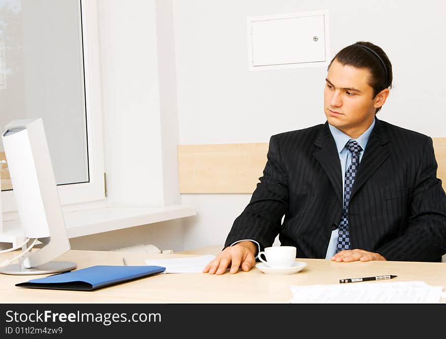 Businessman working in his office