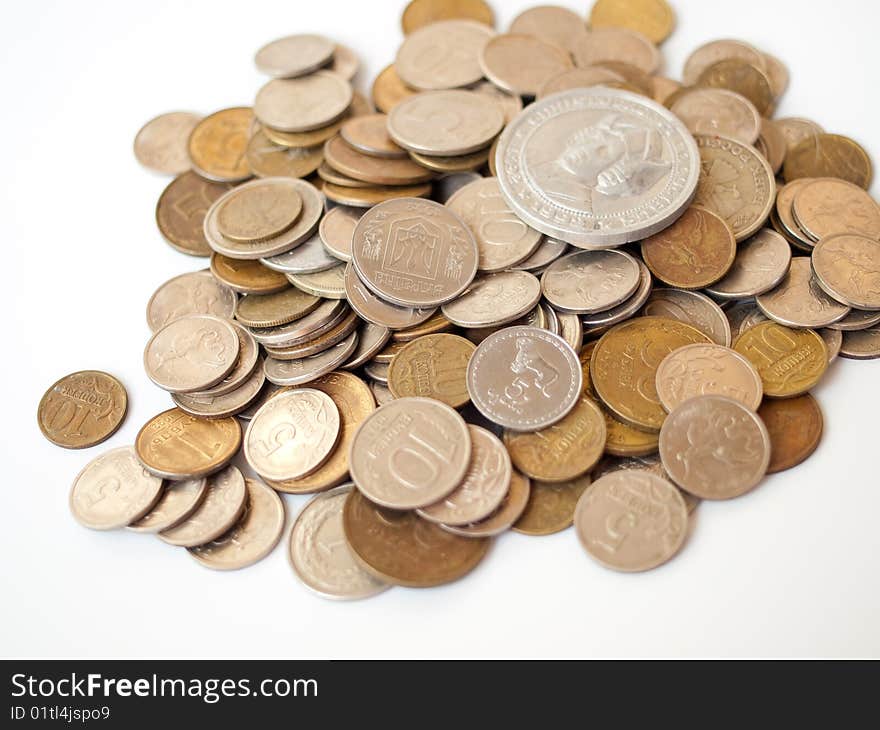 Old coins isolated on white background, shallow depth of field. Old coins isolated on white background, shallow depth of field.