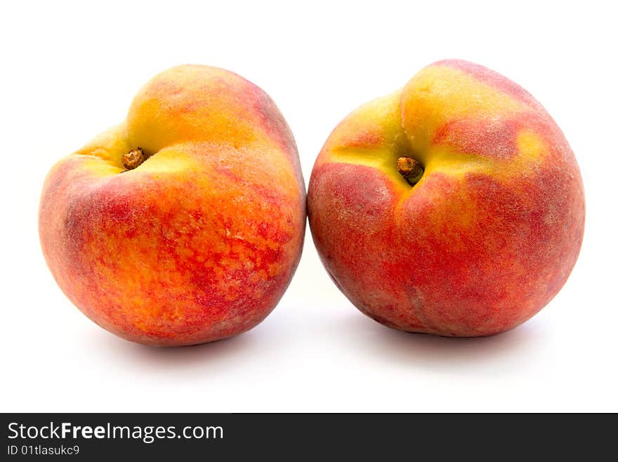 Peaches isolated on white background