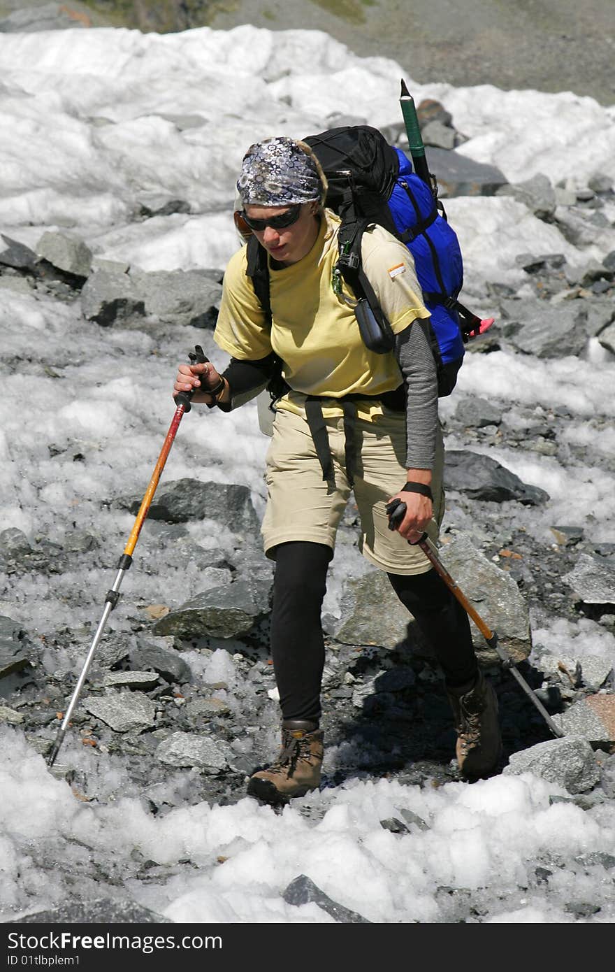 Alpinist on glacier.