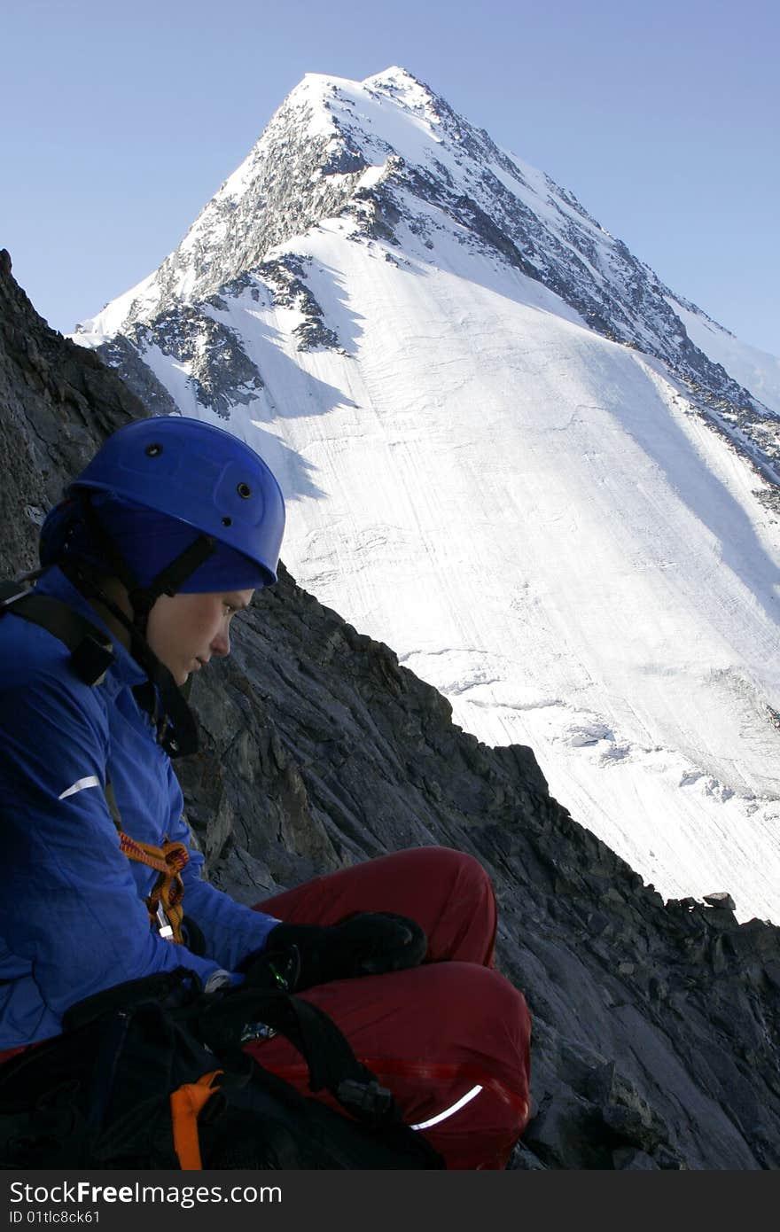 Alpinist and  mountain.