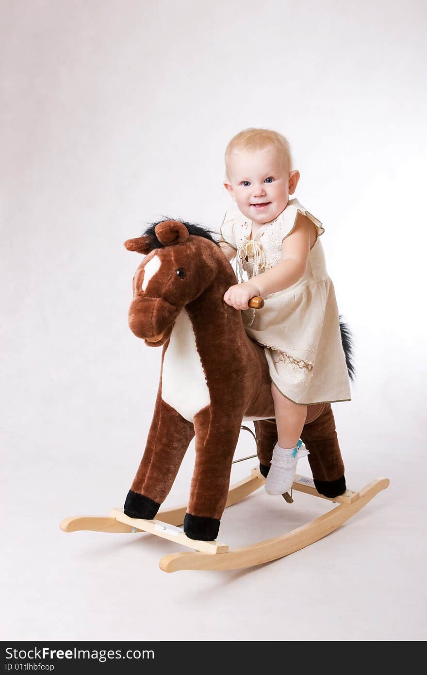 Child on a toy house. Child on a toy house