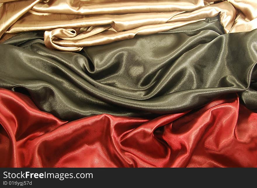 Black red and gold satin