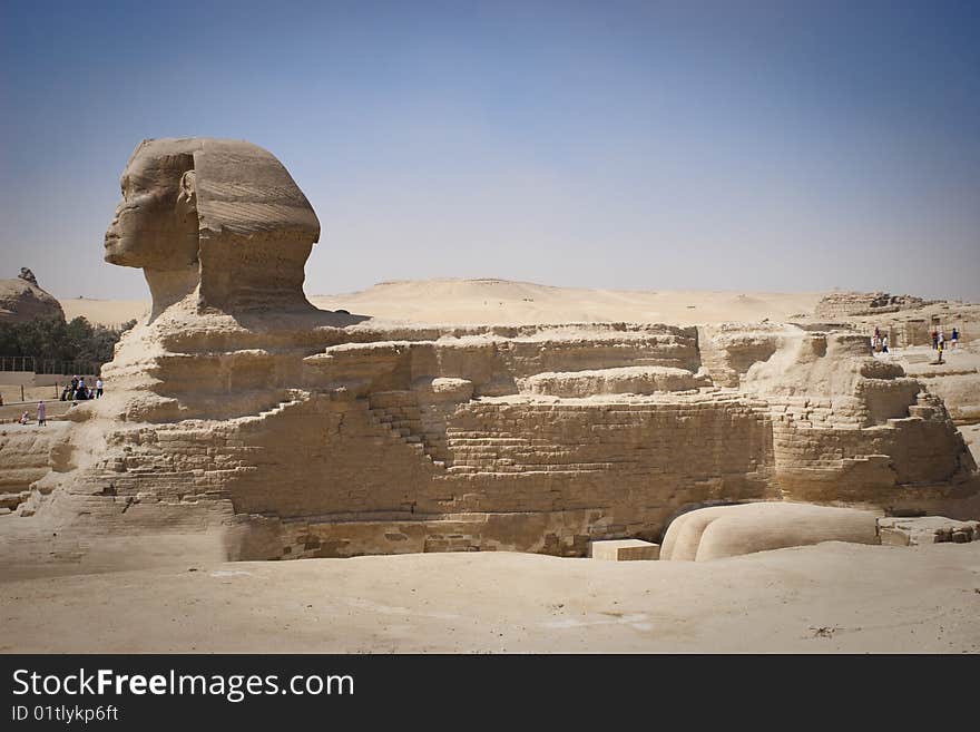 The Great Sphinx of Giza is a statue of a reclining lion with a human head that stands on the Giza Plateau on the west bank of the Nile, near modern-day Cairo, in Egypt. It is the largest monolith statue in the world, standing 73.5 m (241 ft) long, 6 m (20 ft) wide, and 20 m (65 ft) high. It is the oldest known monumental sculpture, built on the third millennium BC.
The Great Sphinx was thus belie. The Great Sphinx of Giza is a statue of a reclining lion with a human head that stands on the Giza Plateau on the west bank of the Nile, near modern-day Cairo, in Egypt. It is the largest monolith statue in the world, standing 73.5 m (241 ft) long, 6 m (20 ft) wide, and 20 m (65 ft) high. It is the oldest known monumental sculpture, built on the third millennium BC.
The Great Sphinx was thus belie