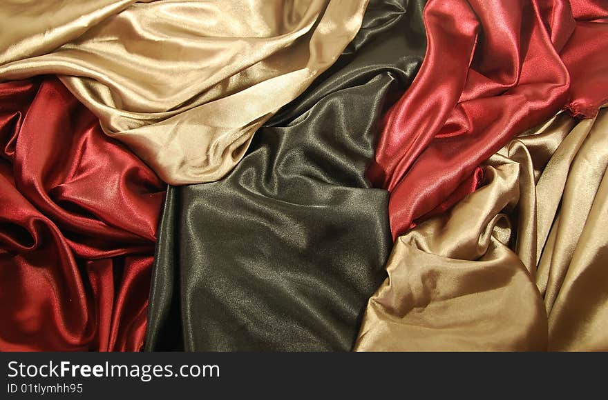 Black red and gold satin