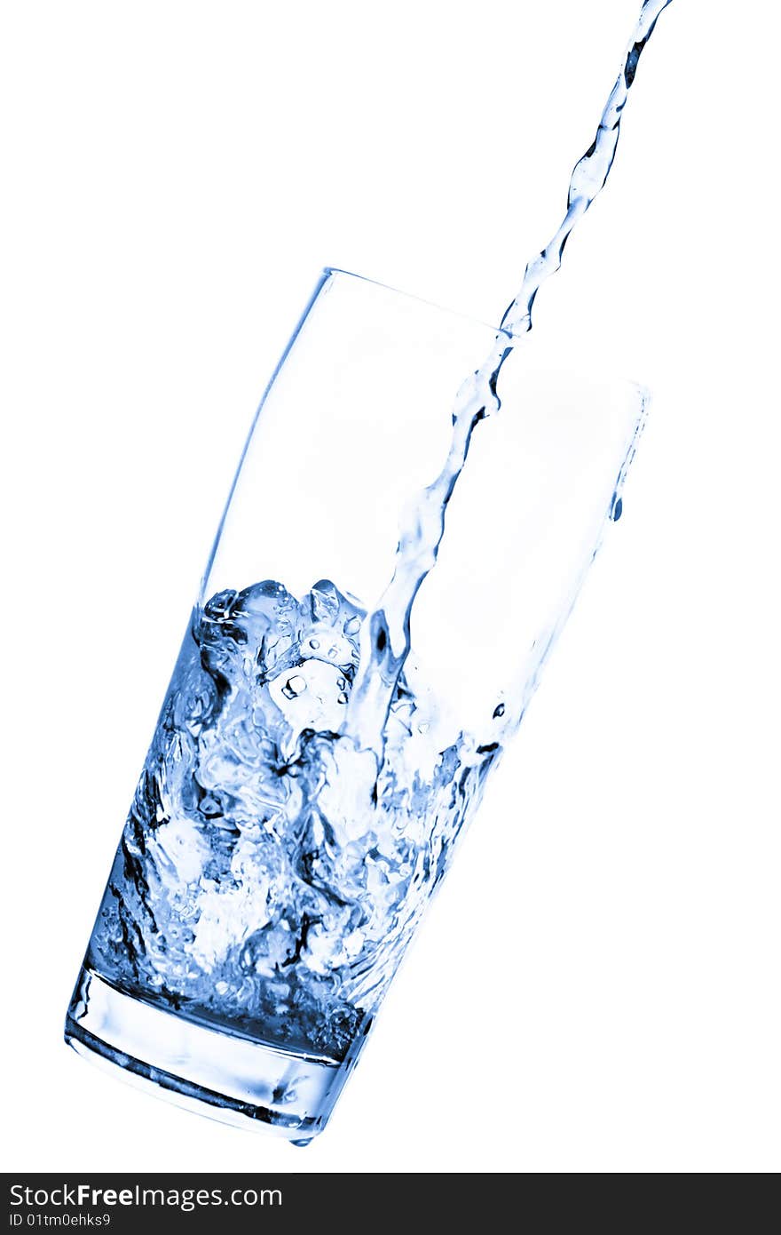 Water in glass with splashes - isolated on white